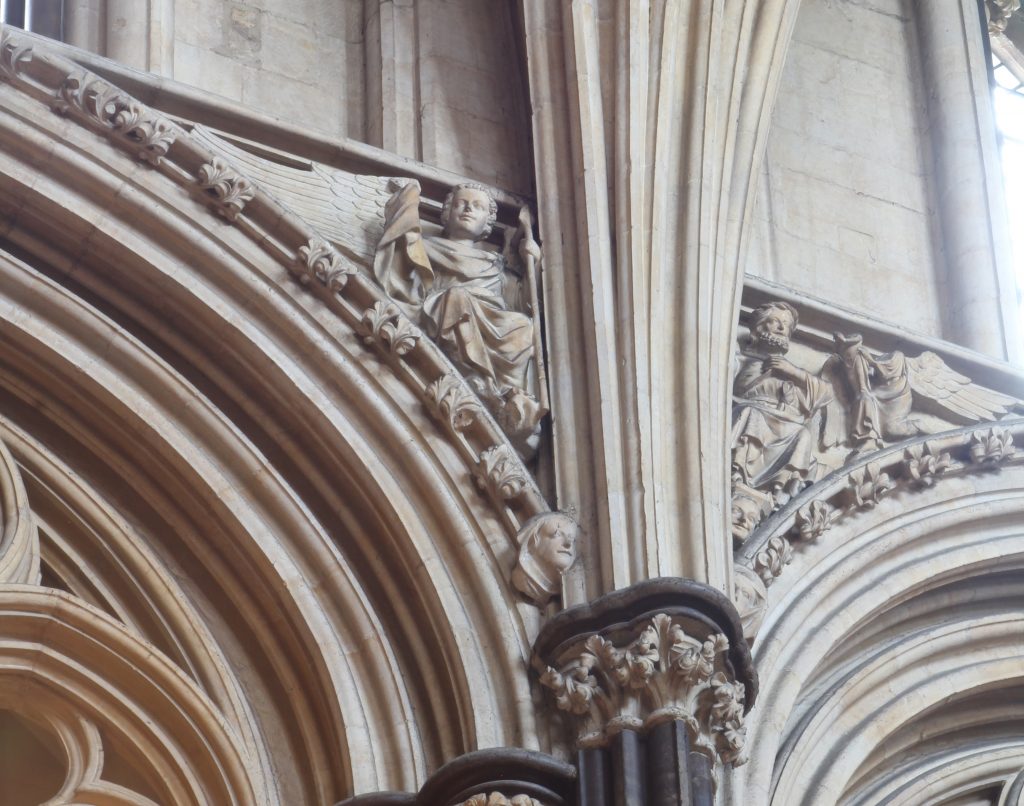 Image of angelic spandrel sculptures in the Angel Choir at Lincoln Cathedral