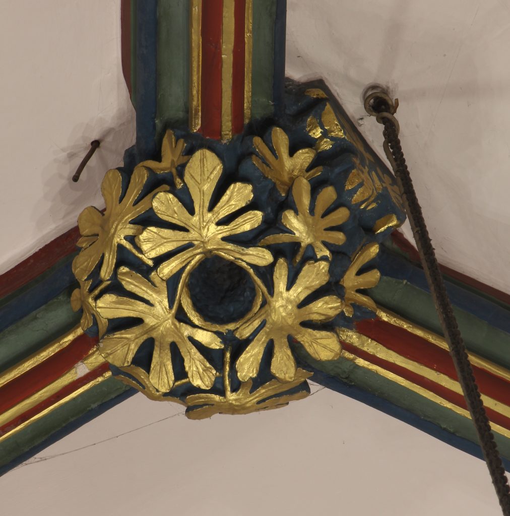 Image of sculpted boss in the Lady Chapel at Chester Cathedral, showing exposed rib stub