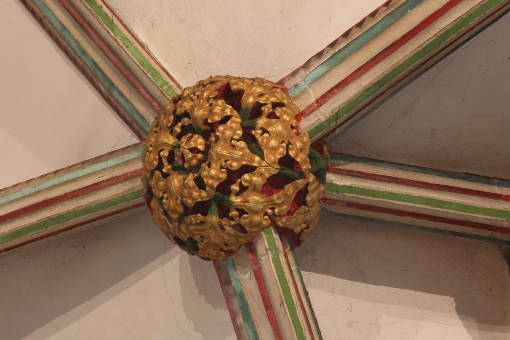 Image of boss at the intersection between the window tunnels and the central vessel of the vaultin the Lady Chapel at Wells Cathedral