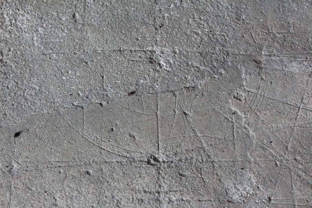 Detail of the tracing floor at Wells Cathedral, showing incised markings related to the corner of the design for the vault in the east walk of the cloister at Wells