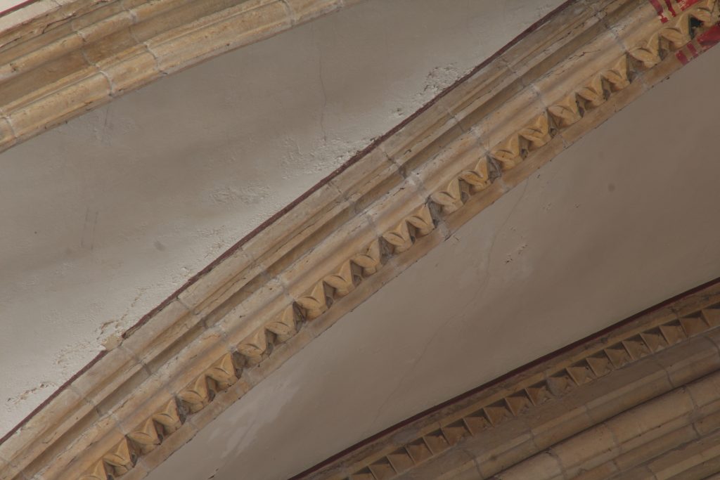 Image of dogtooth pattern rib moulding in the north arm of the great transept at Lincoln Cathedral