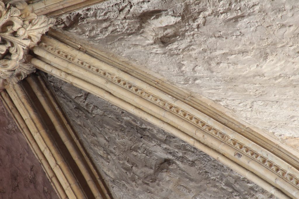 Image of dogtooth pattern rib moulding in the south arm of the east transept at Lincoln Cathedral